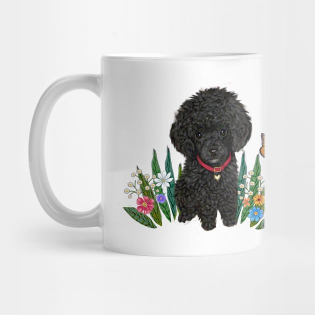 Black Fluffy Poodle Sitting on Grass with Flowers by Dogs Galore and More